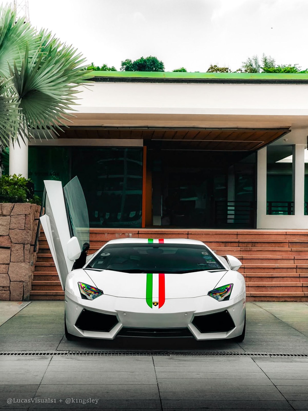 White Lamborghini Aventador with Italian tricolore stripe, doors up